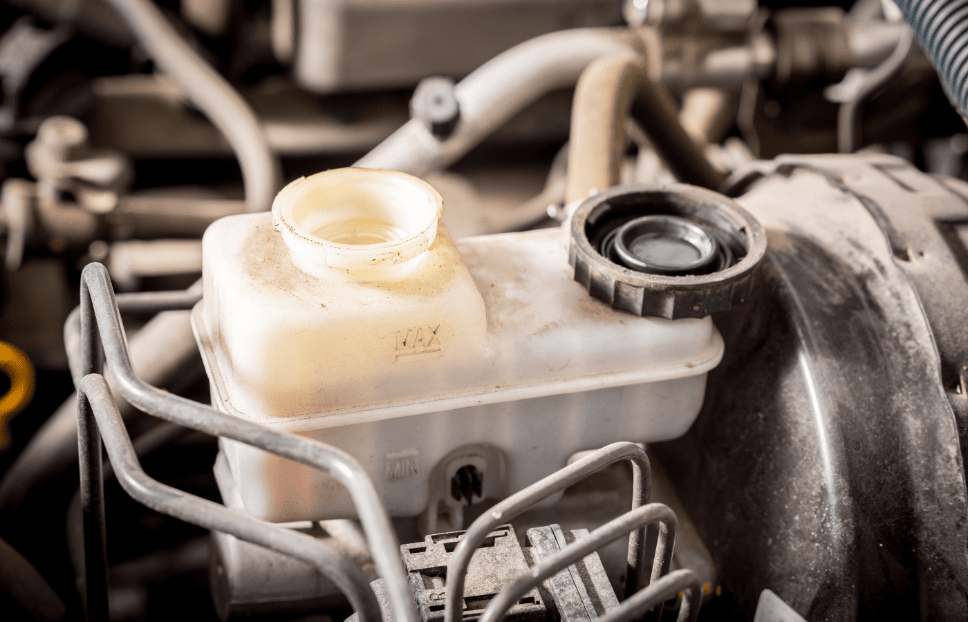 can you drive without a brake fluid cap?